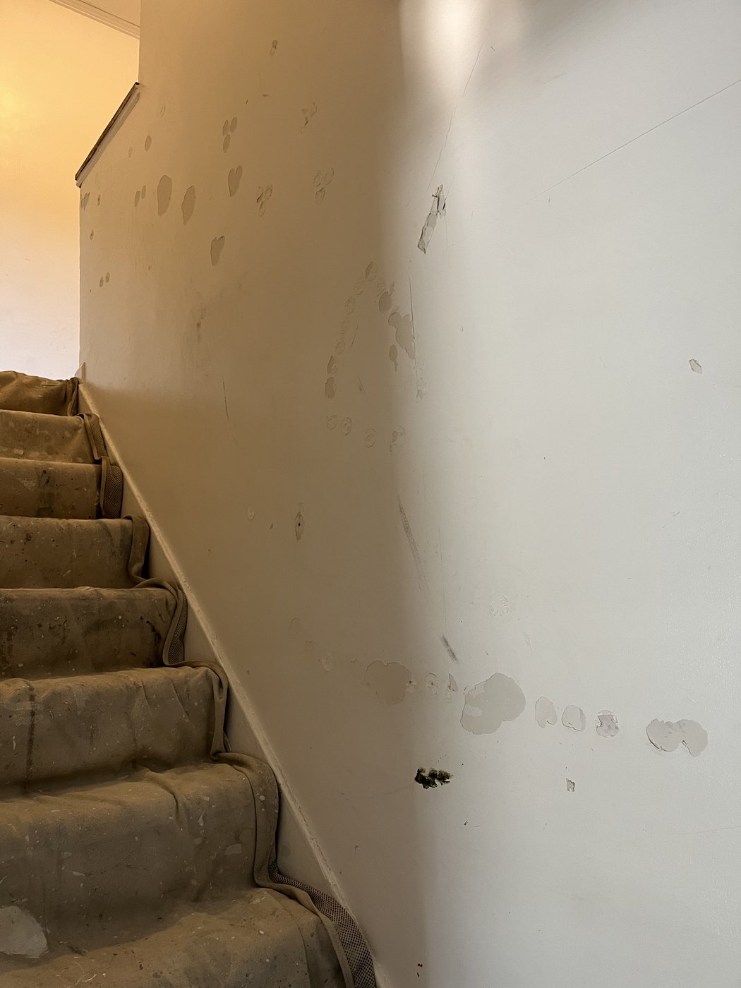 Before repair, sticker residue damage